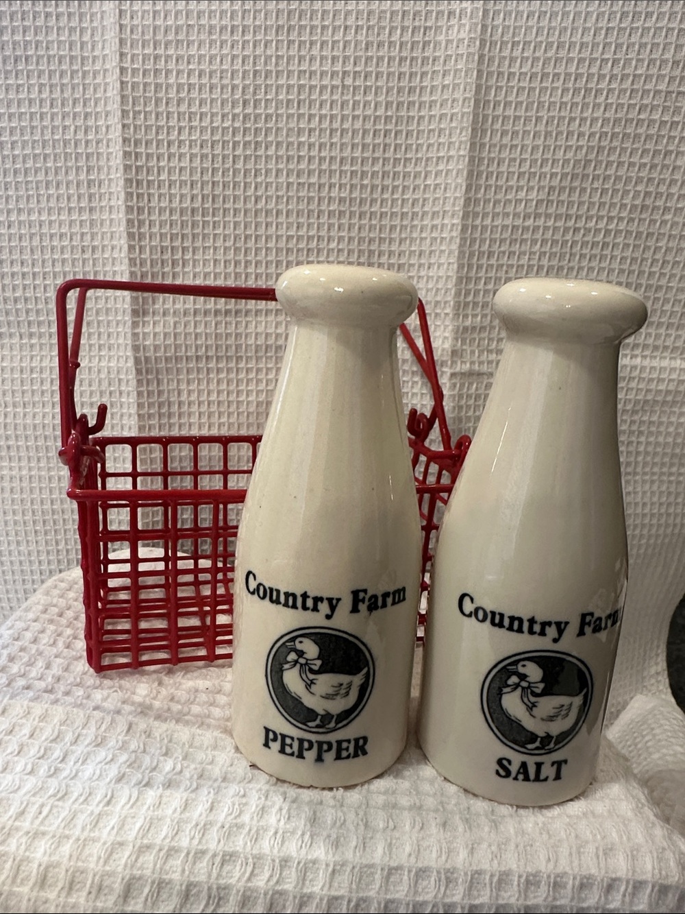 Cream Ceramic Salt & Pepper Set in Red Metal Carrier